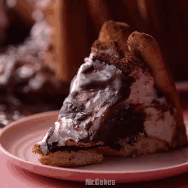 a slice of cake on a plate that says mr.cakes on it