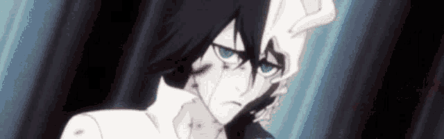 a close up of a person 's face with blood coming out of it