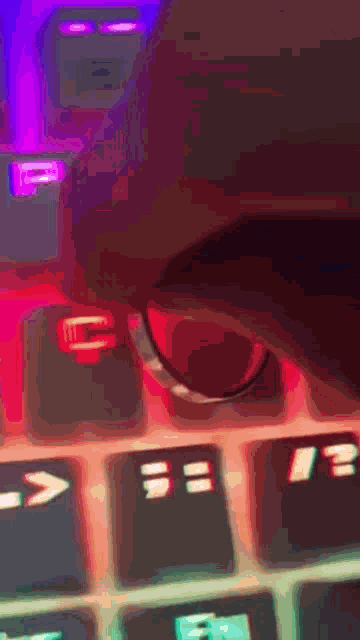 a close up of a person pressing a key on a computer keyboard