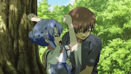 a boy and a girl are standing next to each other