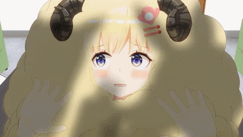 a girl with horns and a heart on her head