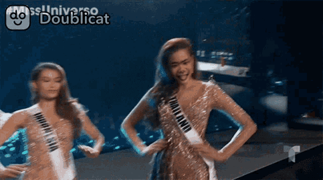 a miss universe contestant is dancing on stage