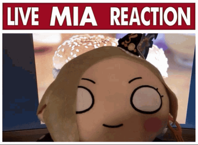 a picture of a stuffed animal with a sign that says live mia reaction