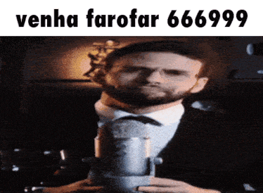 a man in a suit and tie is holding a microphone with the words venha farofar 666999 on the bottom