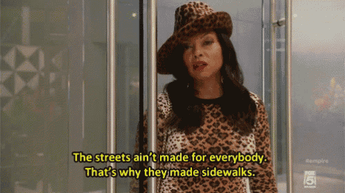 a woman wearing a leopard print shirt and hat says the streets ain 't made for everybody