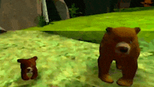 two bears are standing next to each other on a grassy hillside