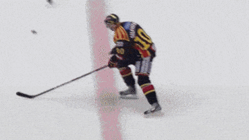 a hockey player with the number 23 on their jersey