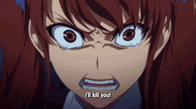 a close up of a girl with red hair saying i 'll kill you