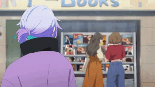a woman in a purple coat is standing in front of a book store