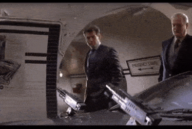 Die Another Day James Bond Underground GIF - Die Another Day James Bond Underground Read Manual GIFs