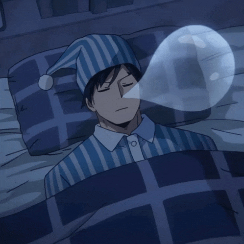 a cartoon character is sleeping in a bed with a bubble coming out of his mouth
