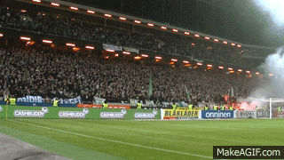 a soccer stadium with a banner that says cashbuddy on it