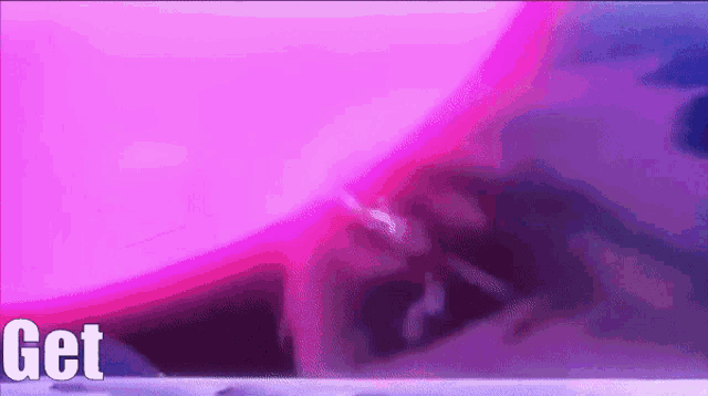 a pink and purple background with the word get in the corner