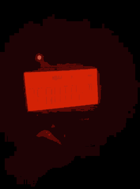 a red screen displays the words ekly tes on it