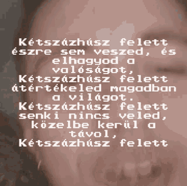 a close up of a woman 's face with a foreign language text behind it