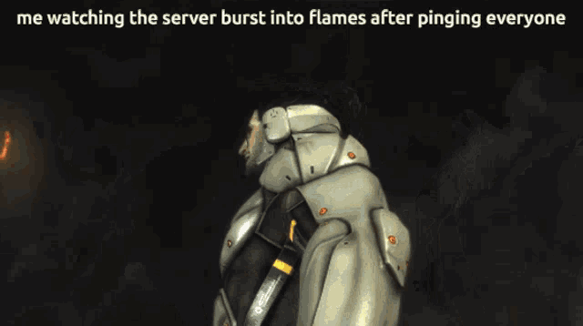 a picture of a man with flames coming out of his head with the caption me watching the server burst into flames