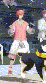 a man in a pink shirt is dancing next to a black dog