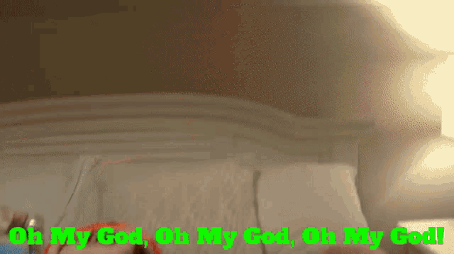 a person laying on a bed with the words oh my god oh my god oh my god written in green