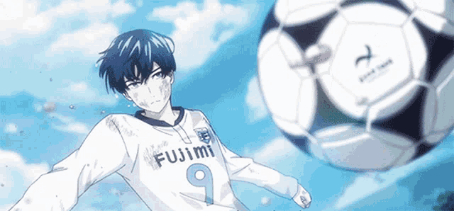 a soccer player with the number 9 on his jersey is kicking a ball