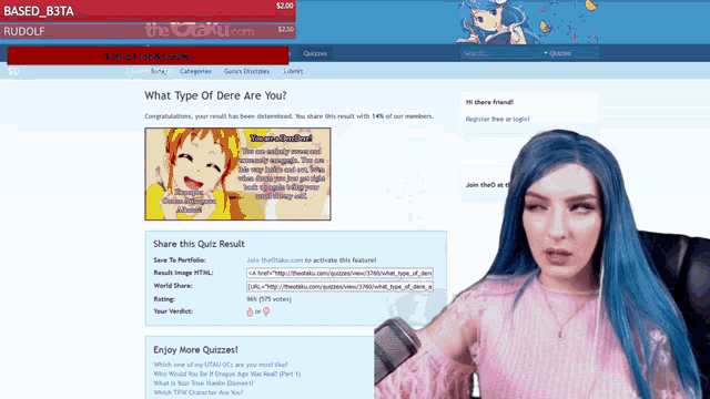a woman with blue hair is sitting in front of a computer screen