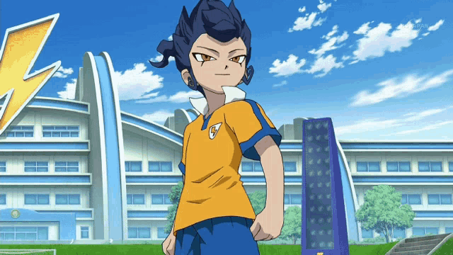 a boy in a yellow shirt with the letter g on the front