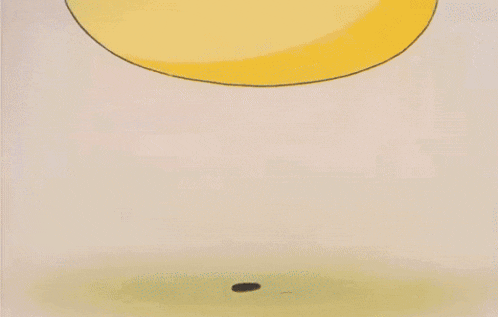 a cartoon character is standing next to a yellow object that looks like an egg .