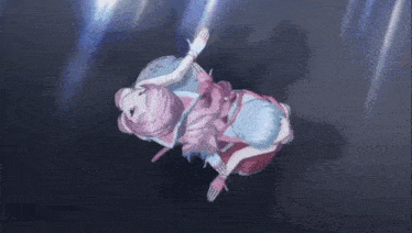 a girl in a pink and blue dress is laying on the ground