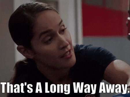 a woman says " that 's a long way away " in a dark room