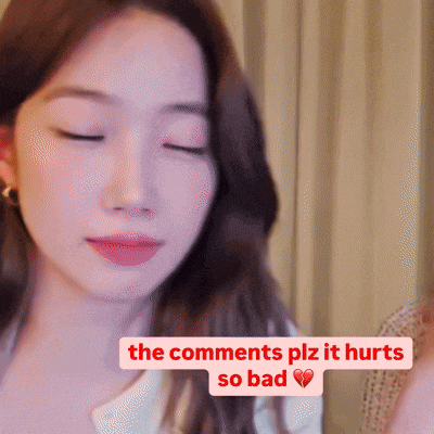 a woman with her eyes closed and the words " the comments plz it hurts so bad "