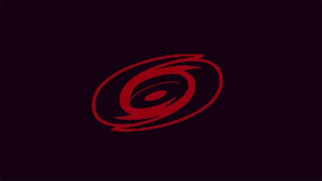 a black and white swirl with the number 6 in the center