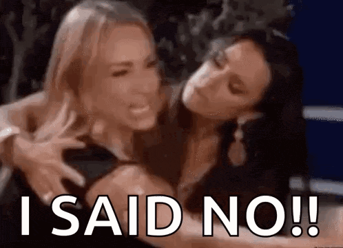 a couple of women are hugging each other and one of them is saying `` i said no ! ''