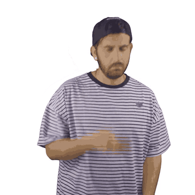 a man wearing a striped shirt and a baseball cap that says eureka