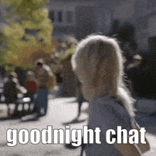 a woman is walking down a street with the words goodnight chat written on the bottom