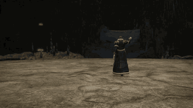 a person standing in a cave with their arms outstretched in the dark