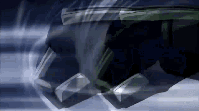 a close up of a person 's face in a video game with a blurred background .