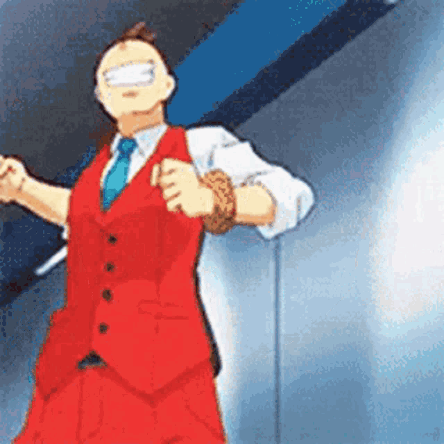 a man in a red vest and tie is dancing in front of a wall .