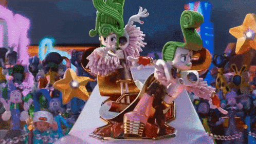 a group of cartoon characters are standing around a pyramid in a crowd