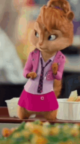 a cartoon chipmunk wearing a pink jacket and tie is standing in front of a plate of food .