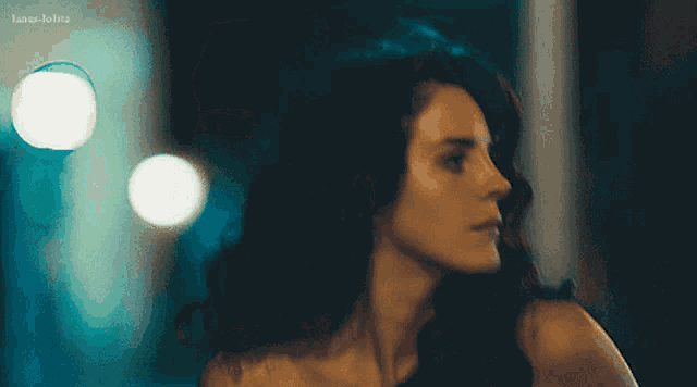 a close up of a woman 's face with the words lana-lolita visible
