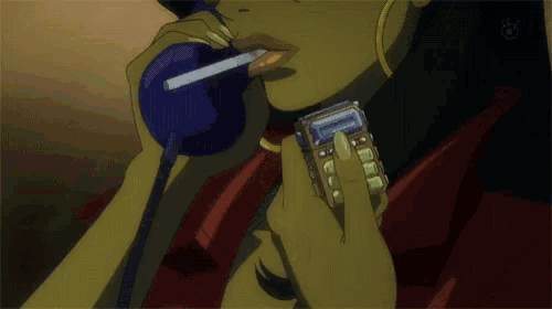 a woman is talking on a cell phone with a sticker on it that says ' a ' on it