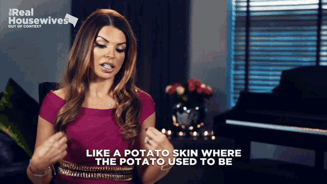 a woman in a purple dress says " like a potato skin where the potato used to be " in front of a piano