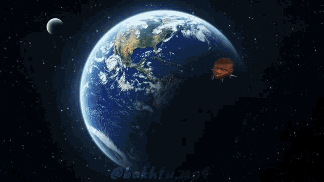 a picture of a man 's head in front of the earth with the caption @bakhtu