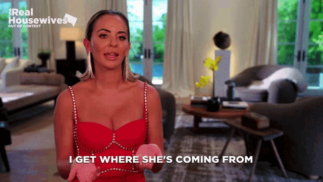 a woman in a red dress with the words i get where she 's coming from