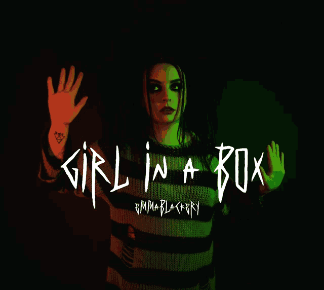 a poster for girl in a box shows a woman reaching out her hand