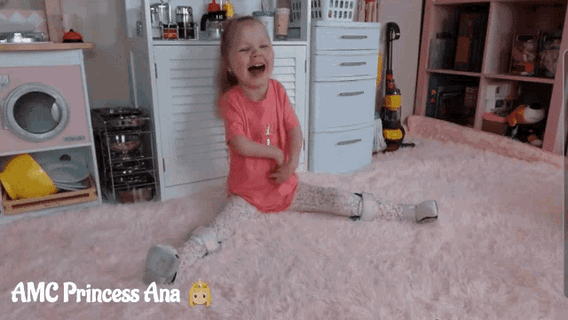 a little girl is sitting on a pink rug with the words amc princess ana written on the bottom