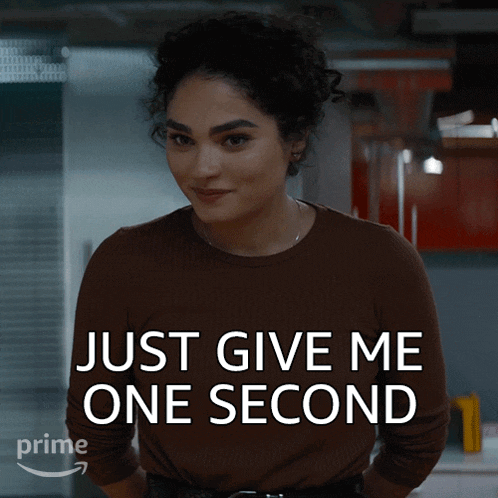 Just Give Me One Second Elaine GIF - Just Give Me One Second Elaine Brittany Ogrady GIFs