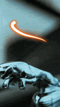 a close up of a jaguar emblem with a glowing orange stripe
