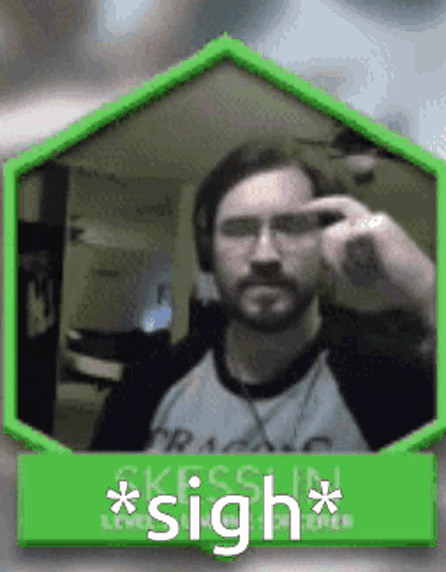 a man with a beard is taking a picture of himself in a green frame with the word sigh on it .