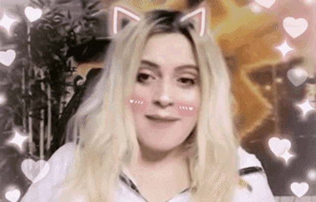 a woman with a cat ear on her head and hearts around her