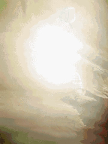 the sun shines brightly through the clouds
